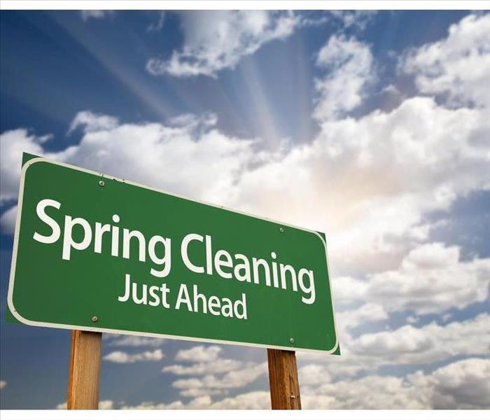 Road sign saying Spring Cleaning Ahead