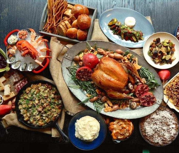 A table that is full of a holiday meal. 
