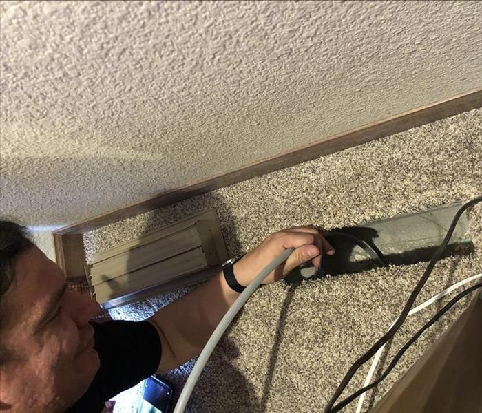 One of our technicians cleaning ducts. 